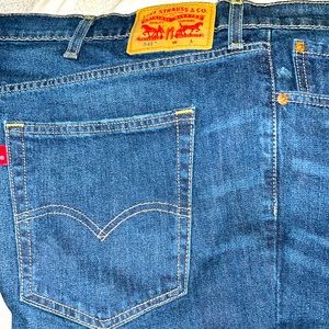 Levi’s 541 men’s 5pocket jeans dark blue distressed, 44x32", NEW never worn.